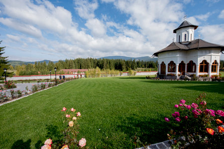 Beautiful landscape with church in the middle of a meadow.の写真素材