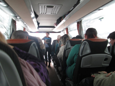 Bus passengers inside the bus. Blurred motion. Rear view.の写真素材
