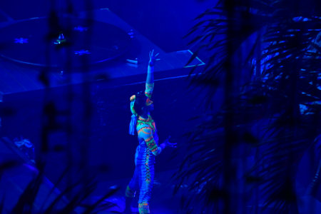 Dancing girl in the night club. Photo taken in Beijing, China.