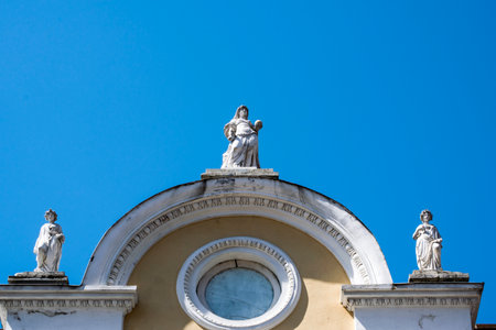 Statue of Virgin Mary on the facade of the Church of the Assumption of the Virgin Mary in Zadar, Croatiaの写真素材