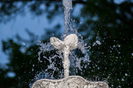 Fountain in the city park, close-up of water splashesの写真素材