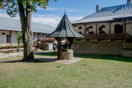 Old water well in the village of Suceava Romaniaの写真素材