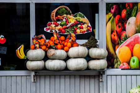 Fruits and vegetables on display at a farmers market in the cityの写真素材