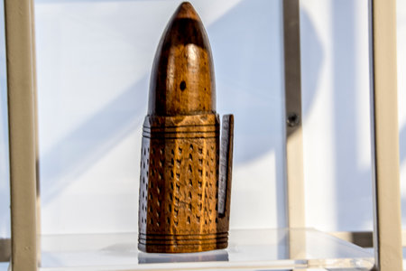 Closeup of a wooden object on a shelf in a shop windowの写真素材
