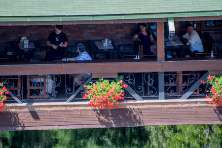 People in a restaurant in Lugano on Switzerlandの写真素材