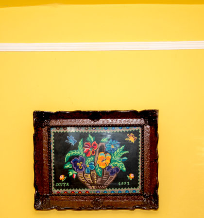 Painted picture frames on the wall in a room, Thailand.