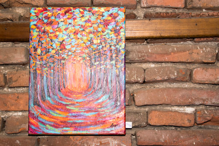 Colorful abstract painting on brick wall background.の写真素材