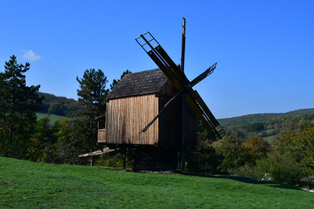 Old wooden windmill on a hillside in the Czech Republic.