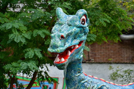 Statue of a dragon in the park, closeup of photoの写真素材