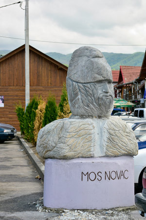 Sculpture of a man in the center of the village.の写真素材