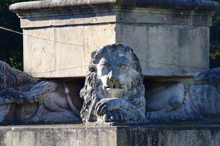 Statue of a lion in the park of Versailles Palaceの写真素材