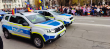 Blurred image of police car during the demonstration in the city.の写真素材