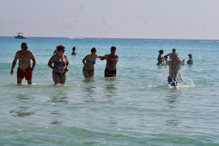 People bathe in the sea on a hot summer day in Cyprus.
