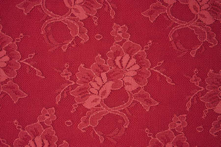texture red lace fabric for the backgroundの写真素材