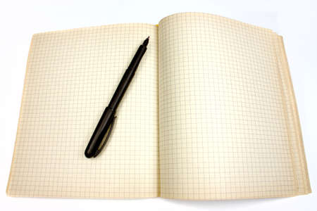 black pen lying on the old open notebookの写真素材