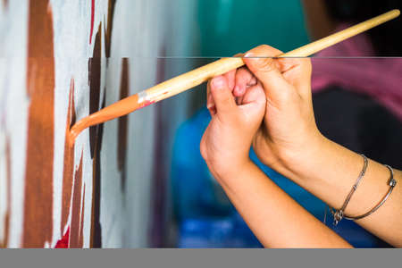 Teach children draw on the wallの写真素材