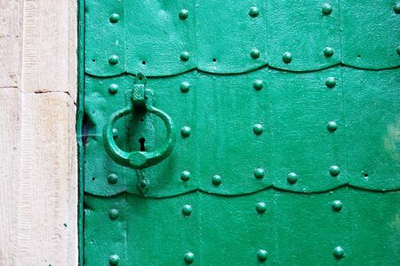 Old green door. Slavic church                               の写真素材