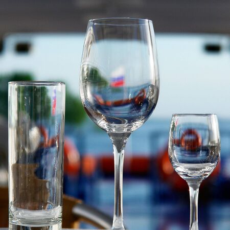 Wineglasses on the served table.