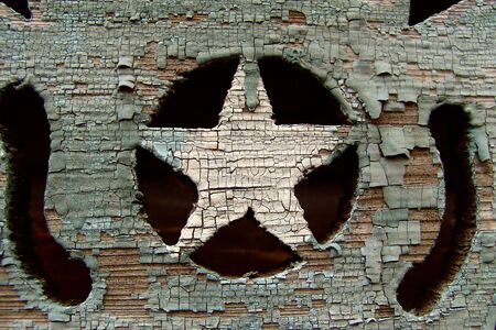 Fragment of old window framing. Wooden star painted with white color                               の写真素材