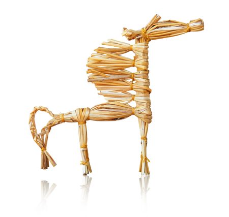 Straw decorative horse. Ukrainian toy. Isolated on white.の写真素材