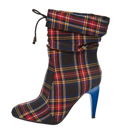 Modern women's boot made from fabric. Isolated on white.の写真素材