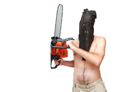 Butcher in the black leather mask is holding chainsaw. Isolated on white.の写真素材