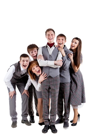 The group of positive students in checkered uniform isolated on white background の写真素材