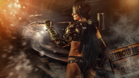 Powerful fantasy woman miner with a heavy sledgehammer. Dark mine on the background.の写真素材