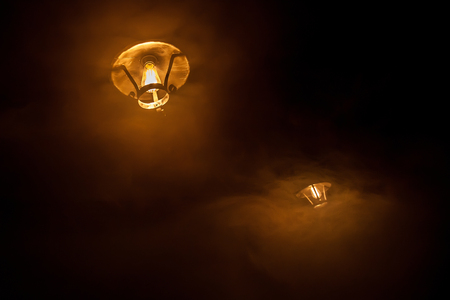 Decorative antique edison style light bulbs chandelier backgroundの写真素材