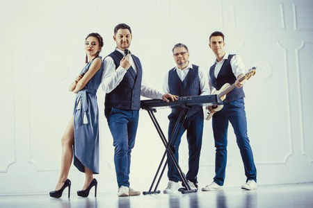 Music band performing in a studioの写真素材