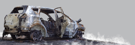 Burnt new car. Isolated on grey background.の写真素材