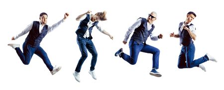 A group of excited jumping students isolated on white