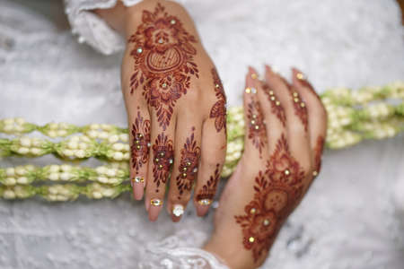 traditional wedding, bridal showing henna design and hand jewelleryの写真素材