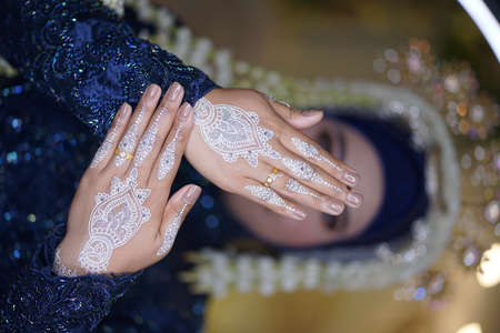traditional wedding, bridal showing henna design and hand jewelleryの写真素材