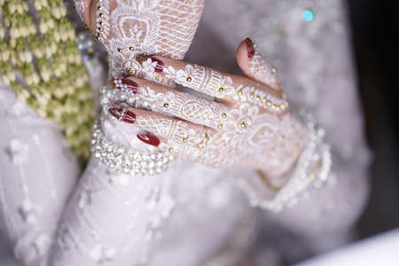 traditional wedding, bridal showing henna design and hand jewelleryの写真素材