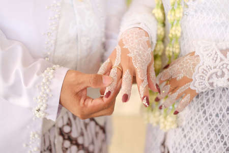 traditional wedding, bridal showing henna design and hand jewellery