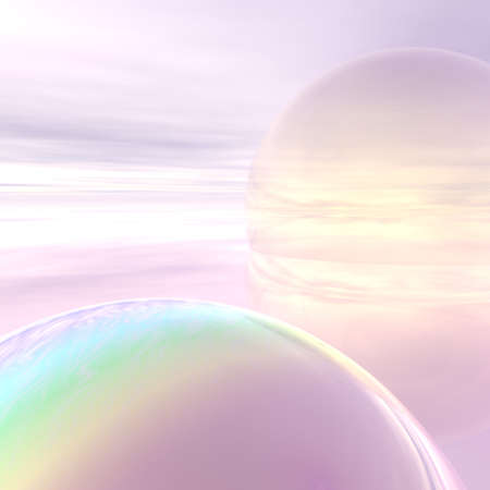 Two brightly lit planet in rainbow colorsの写真素材