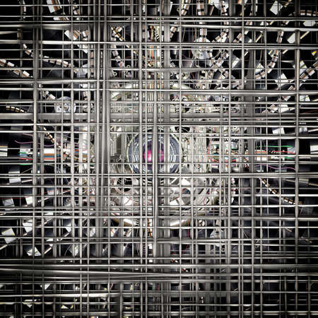 Hidden camera and compact technology behind barsの写真素材