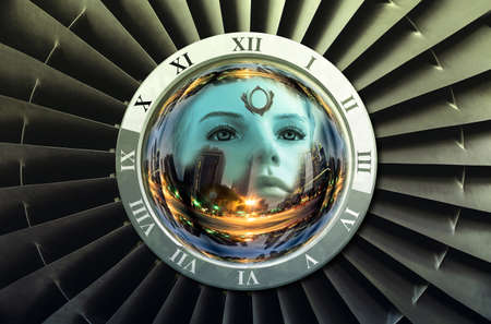 Head of a girl reflected in a buttonの写真素材