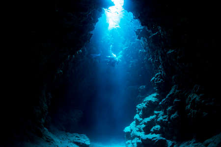 Rays of sunlight into the underwater caveの写真素材