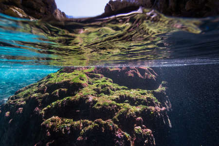 Rays of sunlight into the underwater caveの写真素材