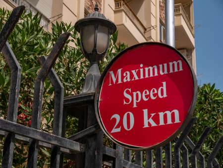 Beautiful red sign with a maximum speed limit of twenty km h. Close-up.の写真素材