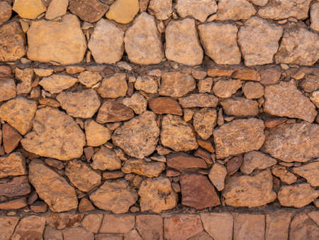 Background. Stone wall with a beautiful texture.の写真素材