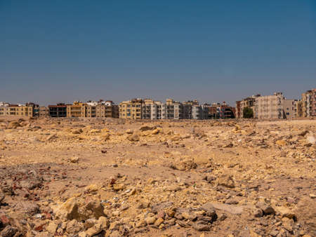 A city on the edge of a rocky desert. Desert landscape.の写真素材