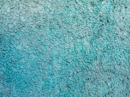 The wall is covered with light emerald concrete plaster.の写真素材