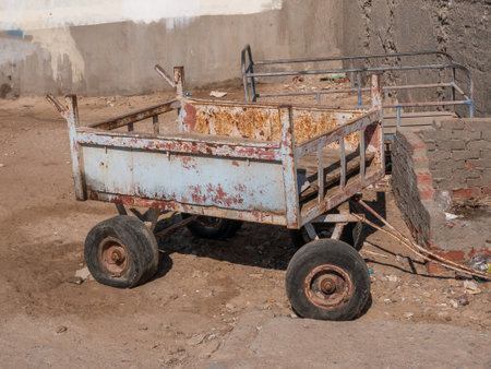 Two old rusty iron carts. The carts are weathered and old.の写真素材