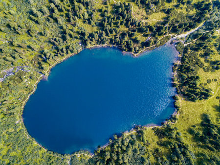 Picture shows a drone view on lake Scheibelsee at Hauseck in Styria, Austria