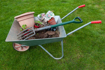 Wheelbarrow and gardening toolsの写真素材