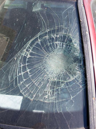 Badly damaged car windscreen
