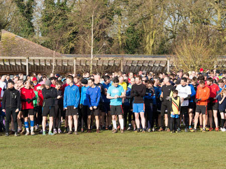 WORCESTER,UK-MARCH 01 2014 : Competitors line up for the start of a Park Run on March 012014 in Worcester,UK. Park Run races are held every Saturday at various locations around the UK and the rest of the World.のeditorial素材